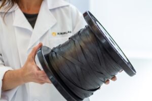 Thermoplastic composites to replace metal components of batteries